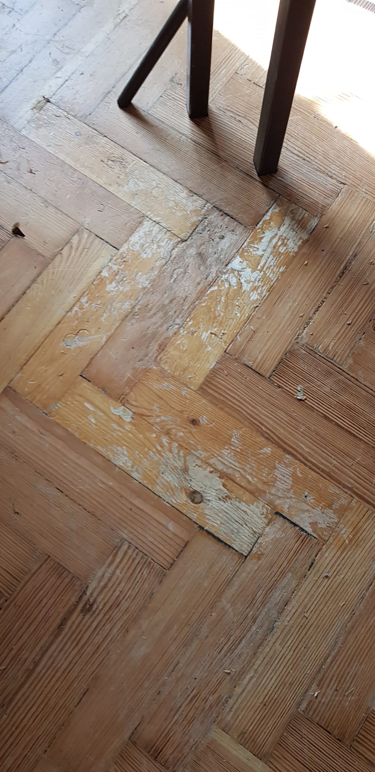 damaged parquet flooring